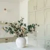 Lifelike Eucalyptus and Cream Magnolia Faux Flower Arrangement, 9 Stems Artificial Flowers for Living Room, Modern Fall Decor, No Watering Needed